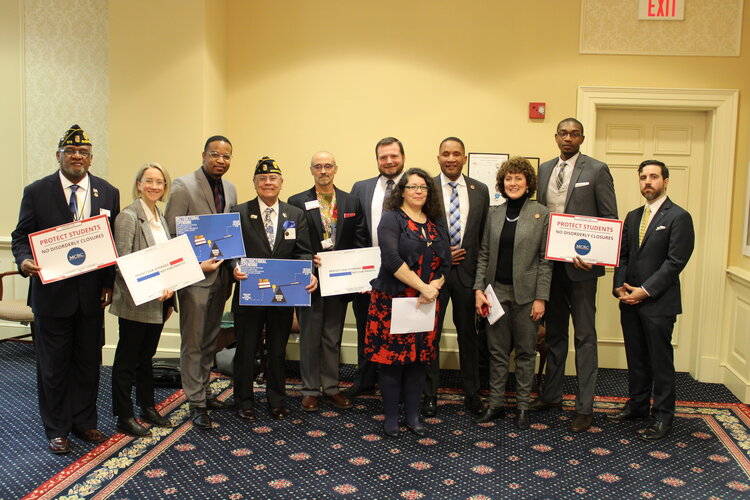 Photo of Economic Action Maryland executive director, legislators, and advocates